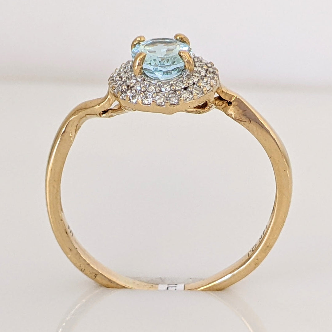 14K AQUAMARINE OVAL 5X7 WITH .23 DIAMOND TOTAL WEIGHT ESTATE HALO RING 2.5 GRAMS