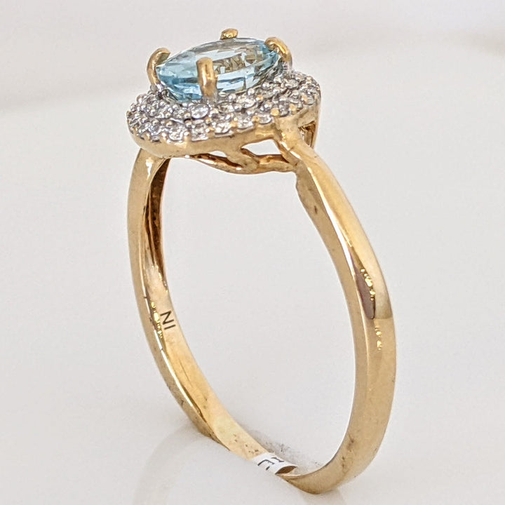 14K AQUAMARINE OVAL 5X7 WITH .23 DIAMOND TOTAL WEIGHT ESTATE HALO RING 2.5 GRAMS