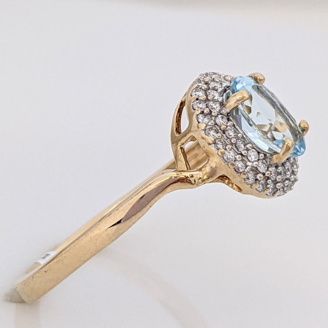14K AQUAMARINE OVAL 5X7 WITH .23 DIAMOND TOTAL WEIGHT ESTATE HALO RING 2.5 GRAMS