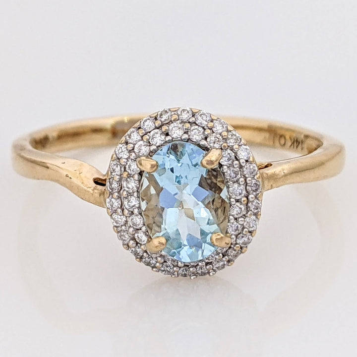 14K AQUAMARINE OVAL 5X7 WITH .23 DIAMOND TOTAL WEIGHT ESTATE HALO RING 2.5 GRAMS