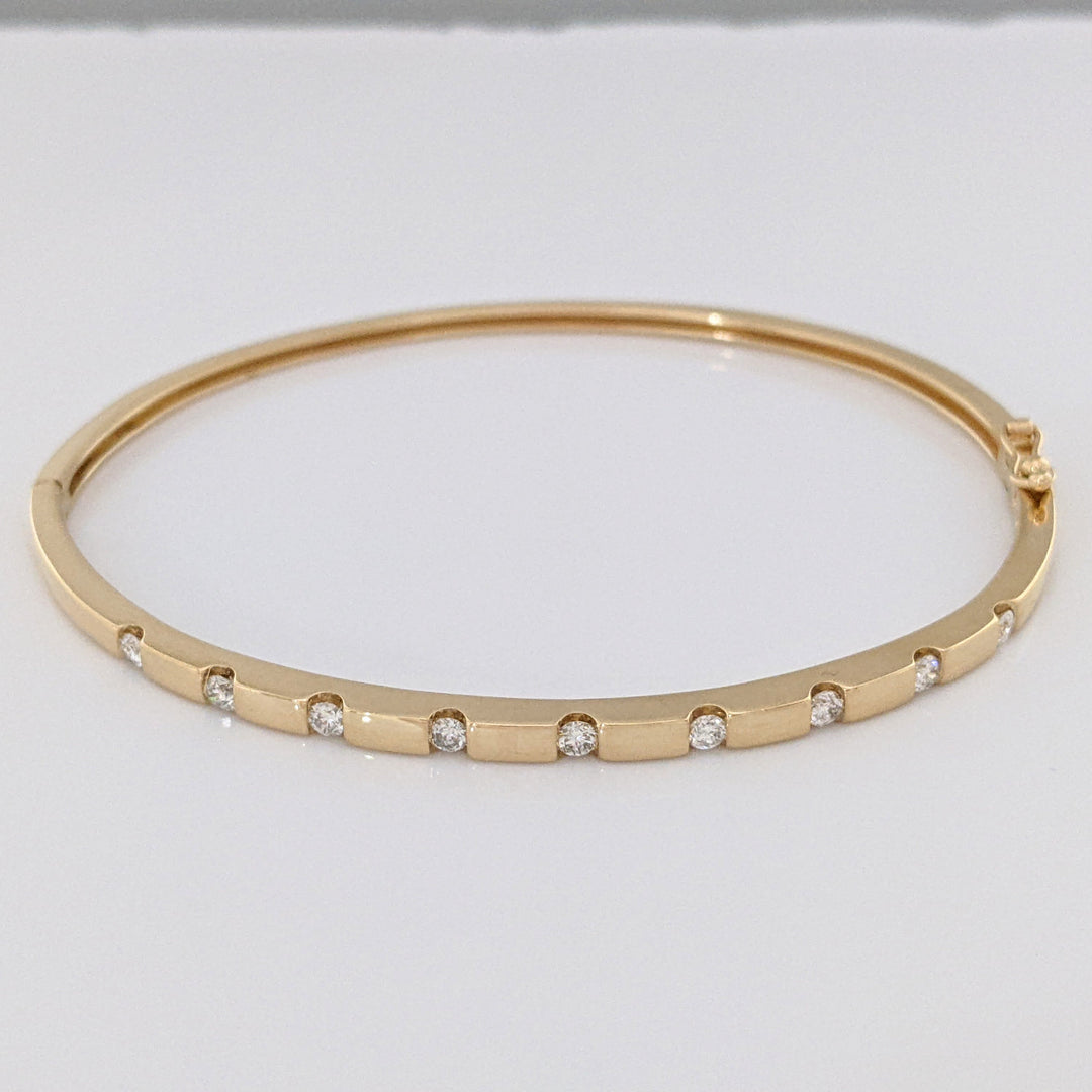 14K .36 CARAT TOTAL WEIGHT I1 I DIAMOND ROUND (9) TENSION SET ESTATE BANGLE 9.0 GRAMS