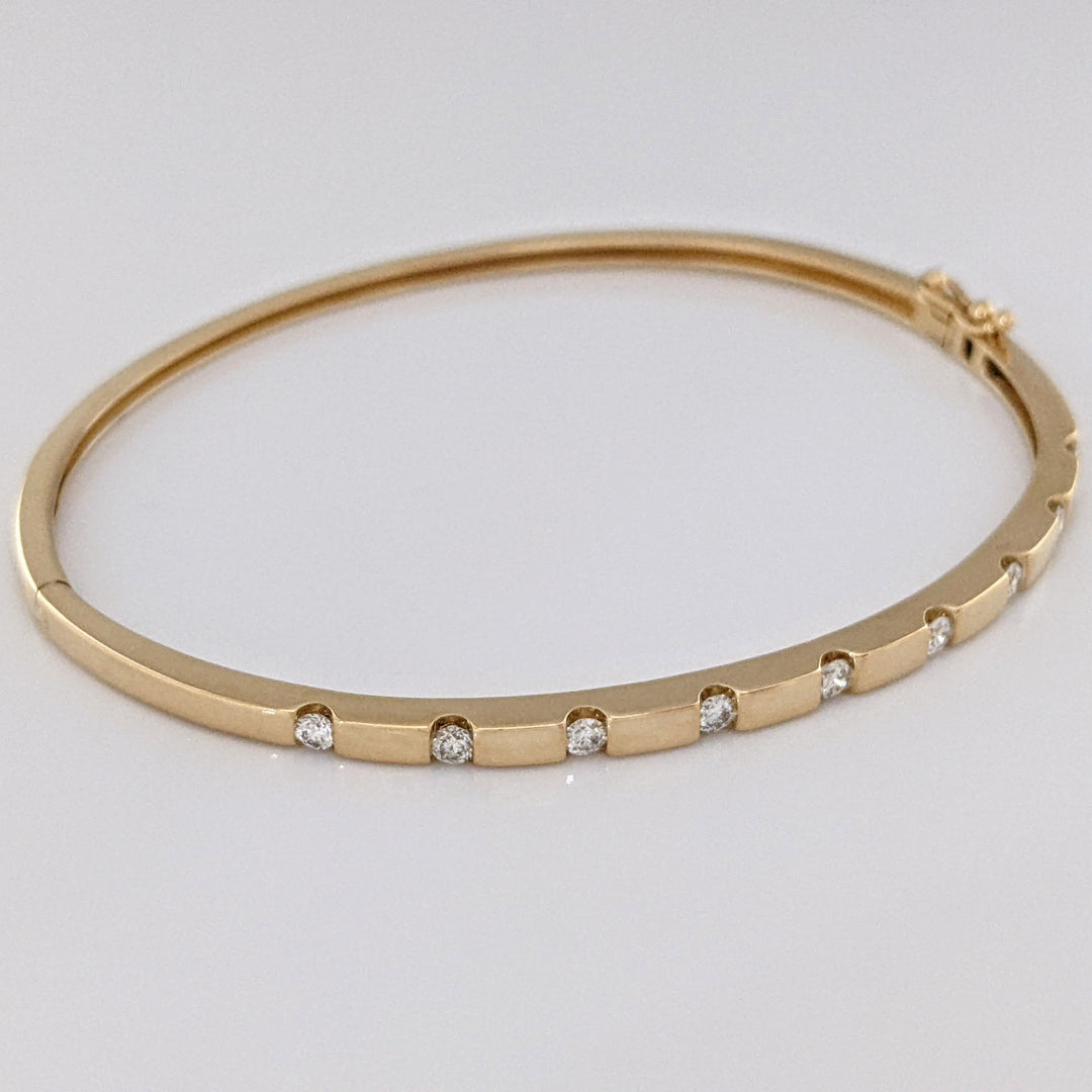 14K .36 CARAT TOTAL WEIGHT I1 I DIAMOND ROUND (9) TENSION SET ESTATE BANGLE 9.0 GRAMS