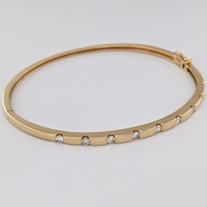 14K .36 CARAT TOTAL WEIGHT I1 I DIAMOND ROUND (9) TENSION SET ESTATE BANGLE 9.0 GRAMS