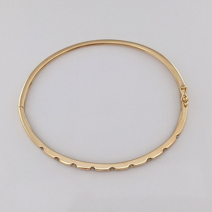 14K .36 CARAT TOTAL WEIGHT I1 I DIAMOND ROUND (9) TENSION SET ESTATE BANGLE 9.0 GRAMS