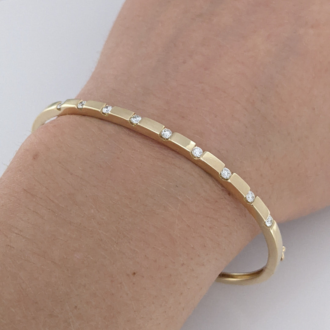 14K .36 CARAT TOTAL WEIGHT I1 I DIAMOND ROUND (9) TENSION SET ESTATE BANGLE 9.0 GRAMS