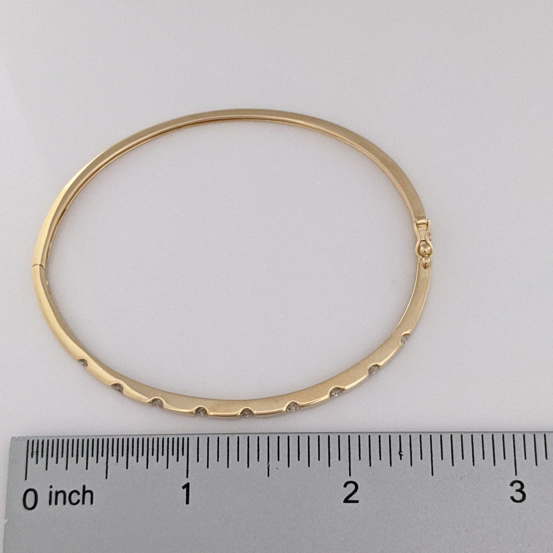 14K .36 CARAT TOTAL WEIGHT I1 I DIAMOND ROUND (9) TENSION SET ESTATE BANGLE 9.0 GRAMS