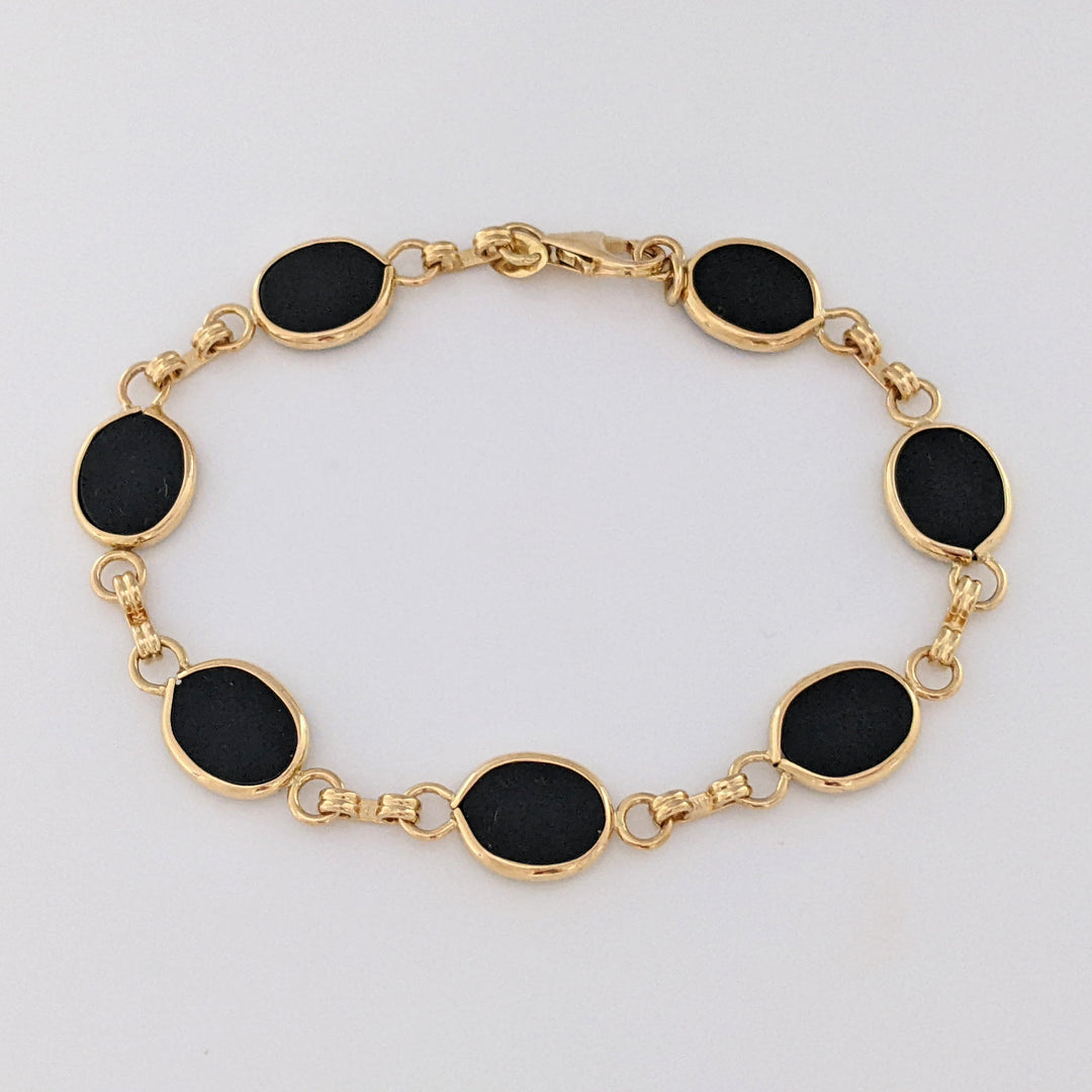 14K ONYX OVAL 7X10 (7) ESTATE BRACELET 7.1 GRAMS