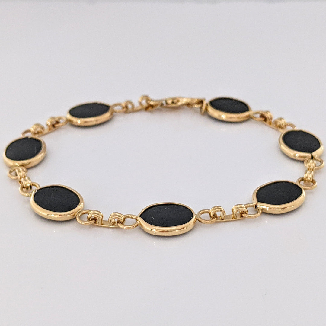 14K ONYX OVAL 7X10 (7) ESTATE BRACELET 7.1 GRAMS