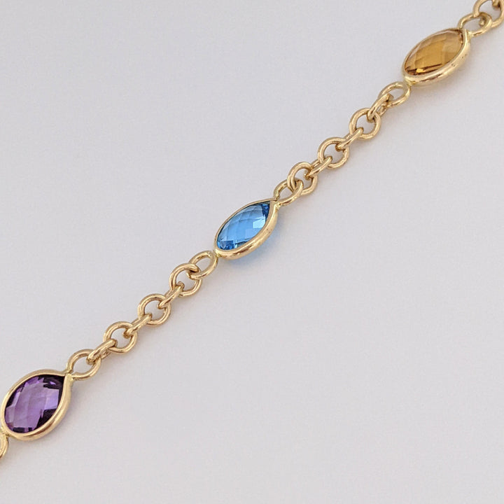 14K PERIDOT, AMETHYST, BLUE TOPAZ, CITRINE, GARNET OVAL 6X8 BEZEL LINK ESTATE BRACELET 6.2 GRAMS