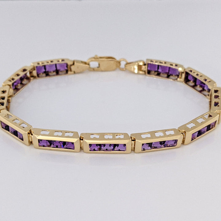 14K AMETHYST PRINCESS CUT (33) 4.0MM CHANNEL ESTATE BRACELET 14.6 GRAMS