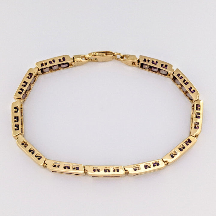 14K AMETHYST PRINCESS CUT (33) 4.0MM CHANNEL ESTATE BRACELET 14.6 GRAMS