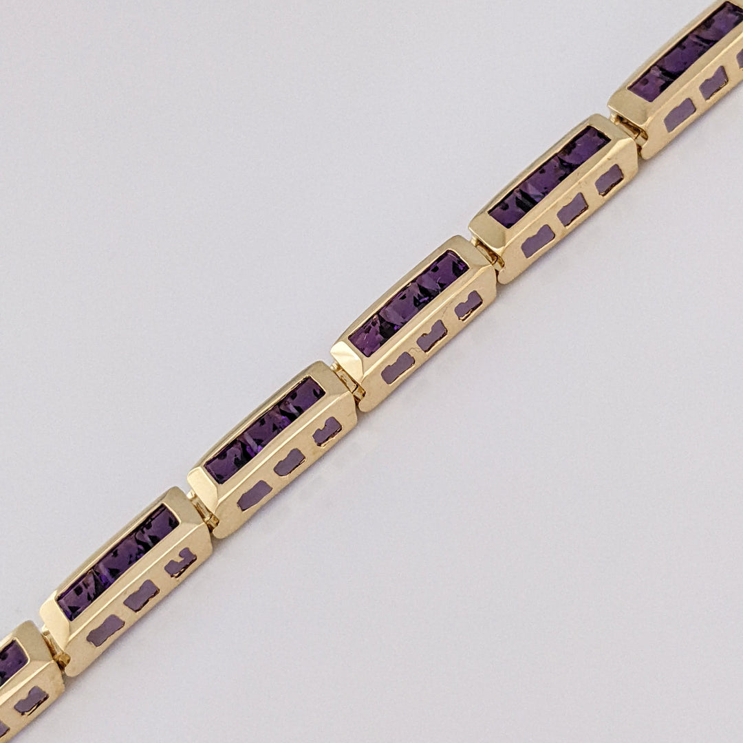 14K AMETHYST PRINCESS CUT (33) 4.0MM CHANNEL ESTATE BRACELET 14.6 GRAMS