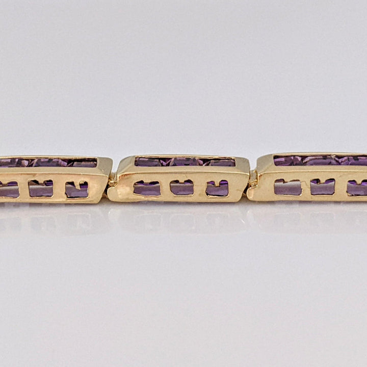 14K AMETHYST PRINCESS CUT (33) 4.0MM CHANNEL ESTATE BRACELET 14.6 GRAMS