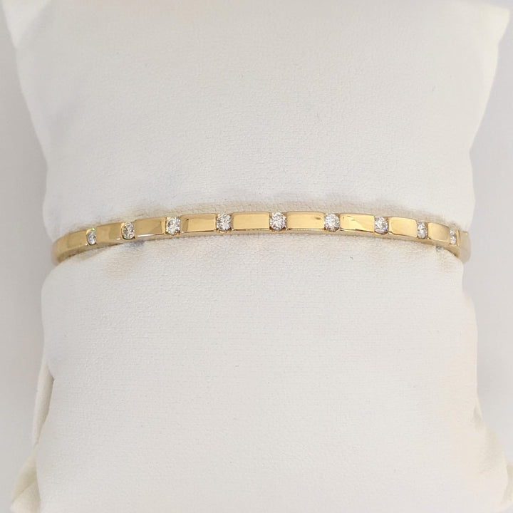 14K .36 CARAT TOTAL WEIGHT I1 I DIAMOND ROUND (9) TENSION SET ESTATE BANGLE 9.0 GRAMS