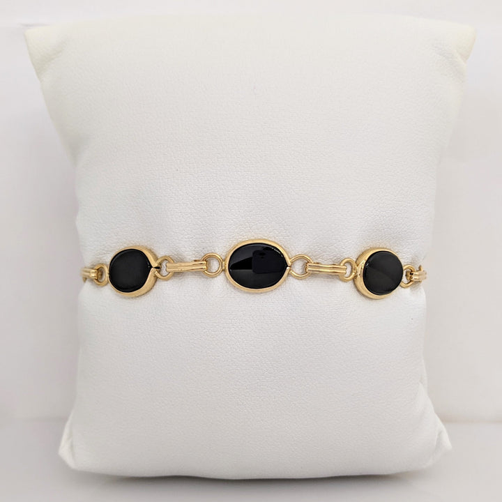 14K ONYX OVAL 7X10 (7) ESTATE BRACELET 7.1 GRAMS