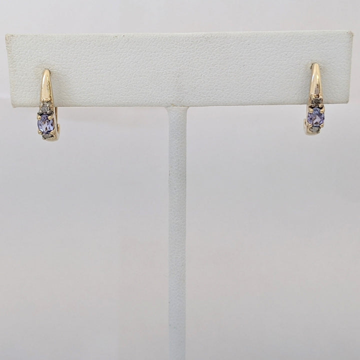 14K TANZANITE OVAL 3X4 WITH (4) MELEE ESTATE EARRINGS 2.2 GRAMS