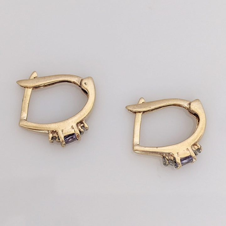14K TANZANITE OVAL 3X4 WITH (4) MELEE ESTATE EARRINGS 2.2 GRAMS