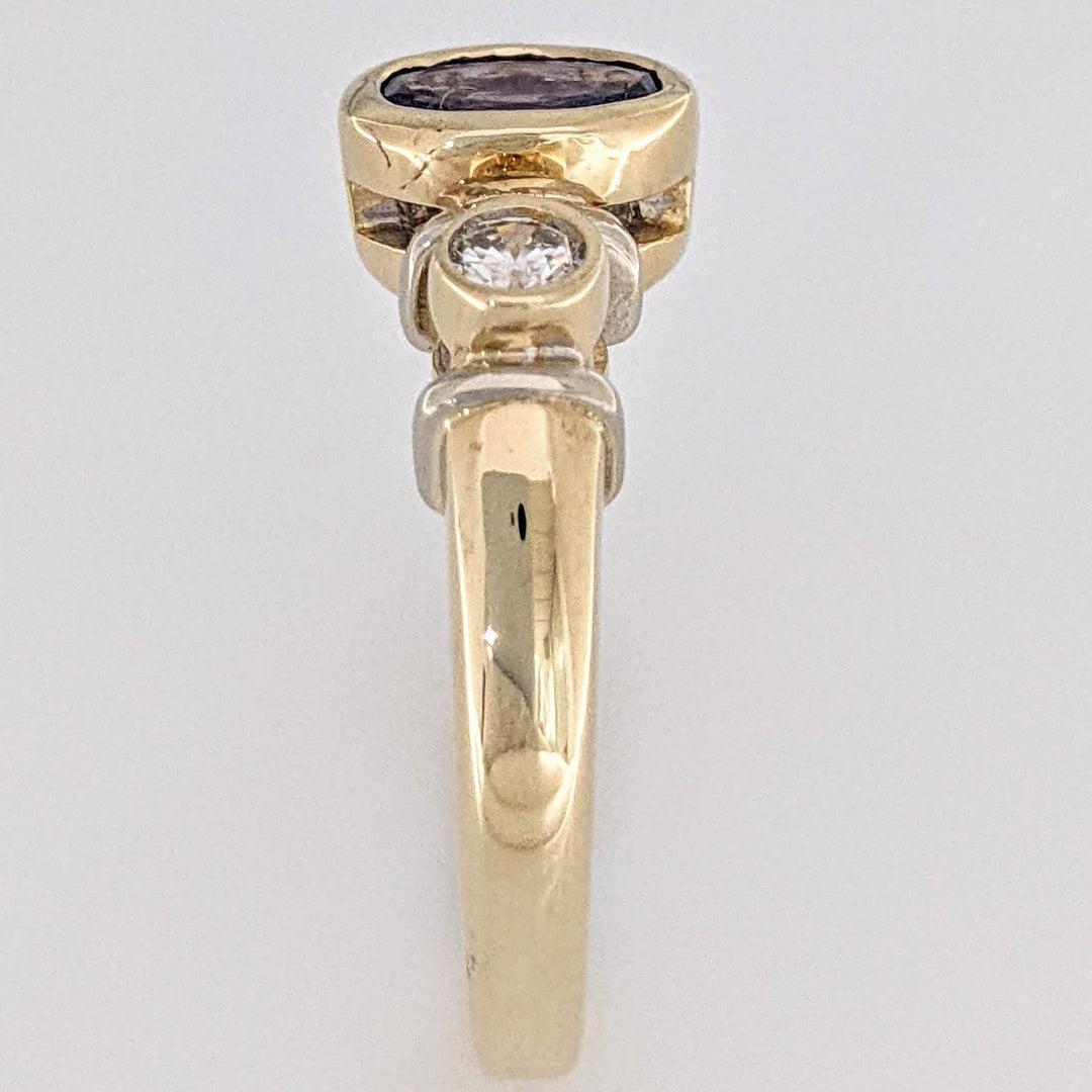 14K TANZANITE OVAL 5X7 BEZEL SET WITH .18 DIAMOND TOTAL WEIGHT ESTATE RING 5.1 GRAMS