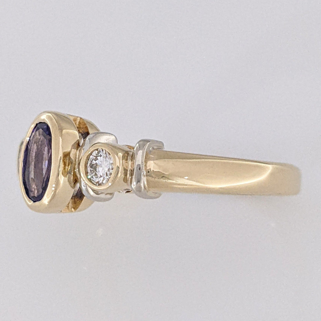 14K TANZANITE OVAL 5X7 BEZEL SET WITH .18 DIAMOND TOTAL WEIGHT ESTATE RING 5.1 GRAMS