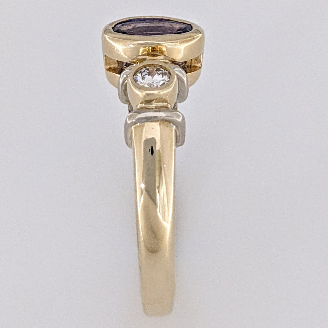 14K TANZANITE OVAL 5X7 BEZEL SET WITH .18 DIAMOND TOTAL WEIGHT ESTATE RING 5.1 GRAMS
