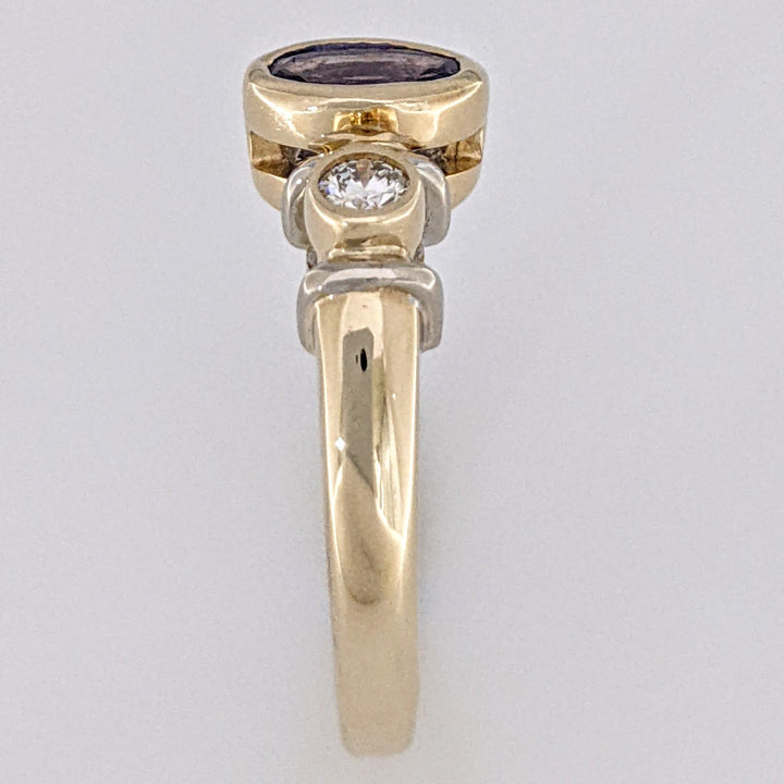 14K TANZANITE OVAL 5X7 BEZEL SET WITH .18 DIAMOND TOTAL WEIGHT ESTATE RING 5.1 GRAMS