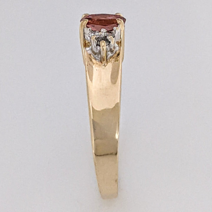 14K PINK TOURMALINE OVAL 4X6 WITH .15 DIAMOND TOTAL WEIGHT ESTATE RING 3.4 GRAMS