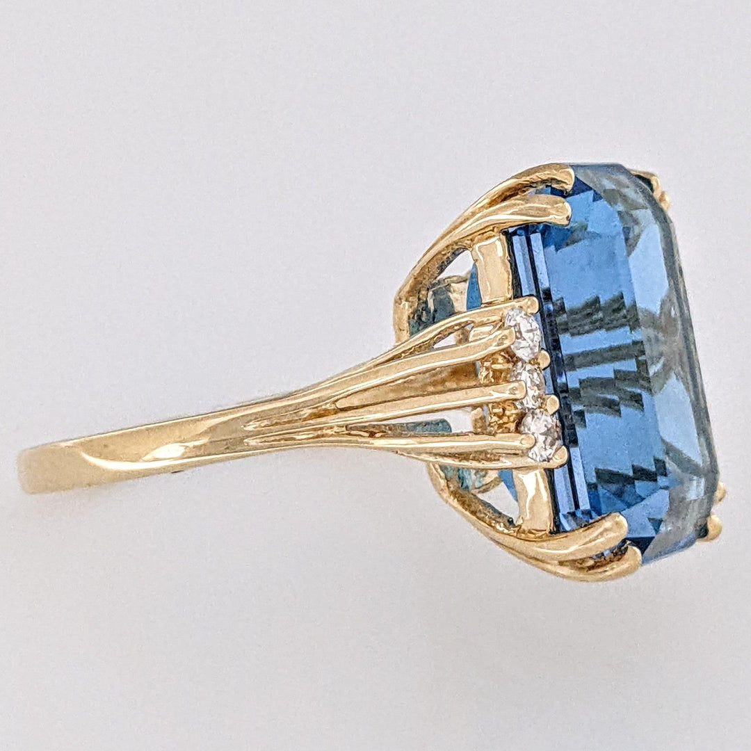14K LONDON BLUE TOPAZ EMERALD CUT 12X16 WITH (6) MELEE ESTATE RING 6.9 GRAMS