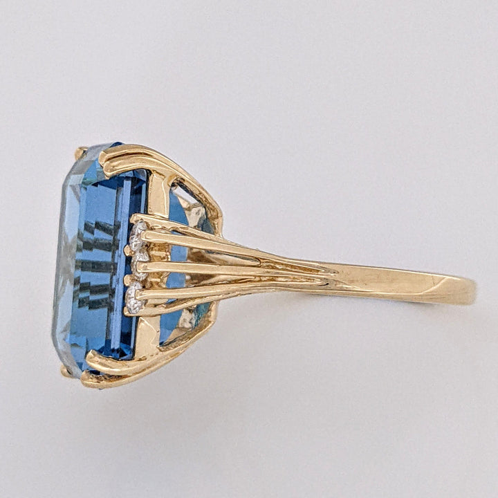 14K LONDON BLUE TOPAZ EMERALD CUT 12X16 WITH (6) MELEE ESTATE RING 6.9 GRAMS