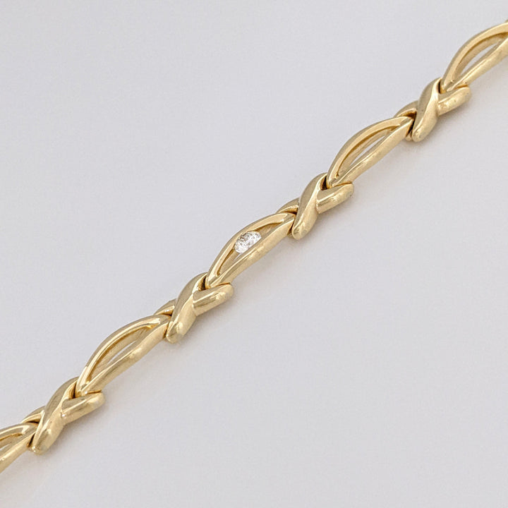 14K .12 CARAT TOTAL DIAMOND ROUND X/OVAL LINK ESTATE BRACELET 16.0 GRAMS