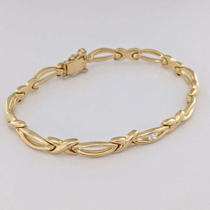 14K .12 CARAT TOTAL DIAMOND ROUND X/OVAL LINK ESTATE BRACELET 16.0 GRAMS