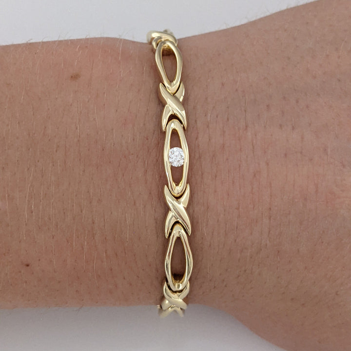 14K .12 CARAT TOTAL DIAMOND ROUND X/OVAL LINK ESTATE BRACELET 16.0 GRAMS