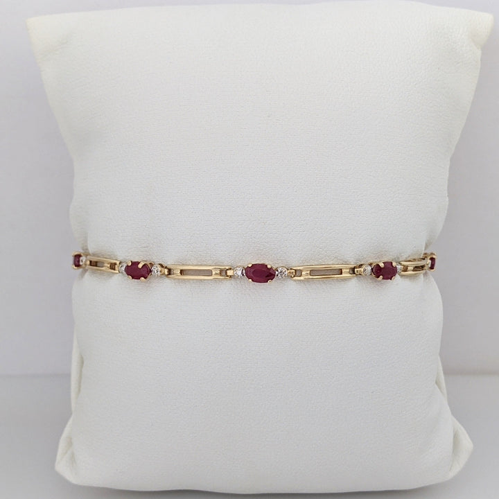 14K RUBY OVAL (8) 3X5 WITH MELEE ESTATE BRACELET 4.3 GRAMS