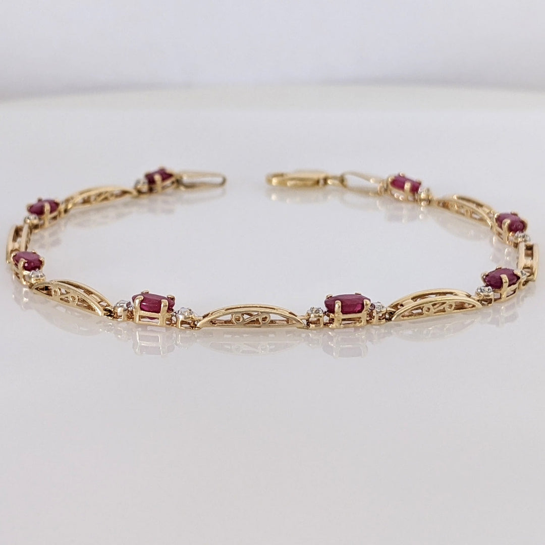 14K RUBY OVAL (8) 3X5 WITH MELEE ESTATE BRACELET 4.3 GRAMS