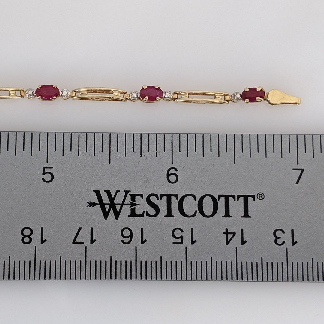 14K RUBY OVAL (8) 3X5 WITH MELEE ESTATE BRACELET 4.3 GRAMS