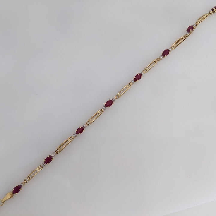 14K RUBY OVAL (8) 3X5 WITH MELEE ESTATE BRACELET 4.3 GRAMS