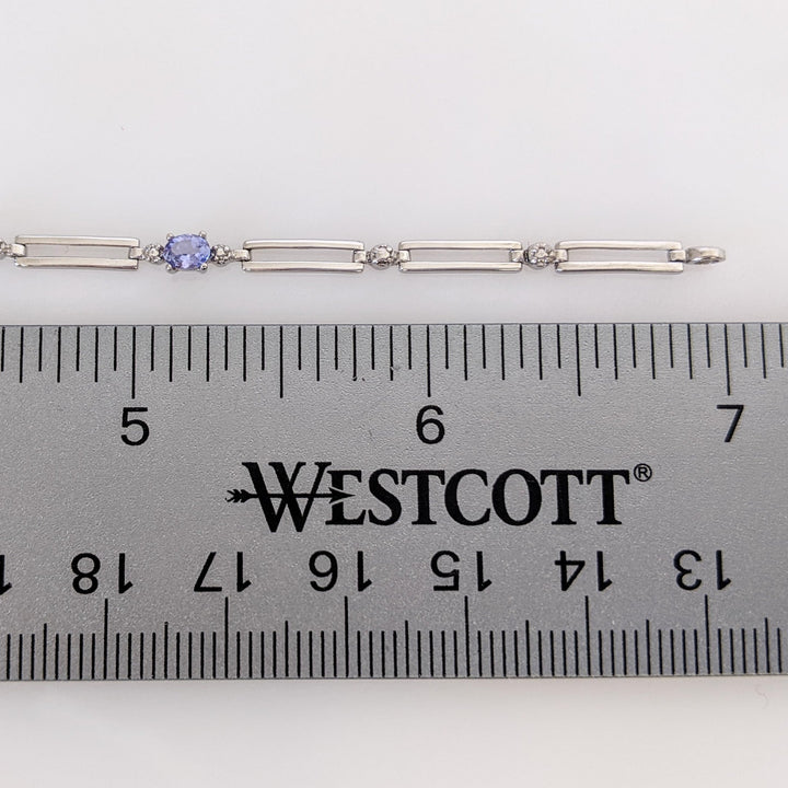 10K WHITE IOLITE OVAL (5) 3X4 WITH (2) MELEE LINK ESTATE BRACELET 3.7 GRAMS