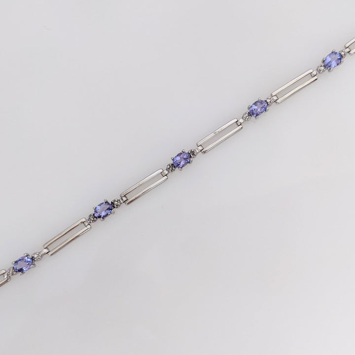 10K WHITE IOLITE OVAL (5) 3X4 WITH (2) MELEE LINK ESTATE BRACELET 3.7 GRAMS