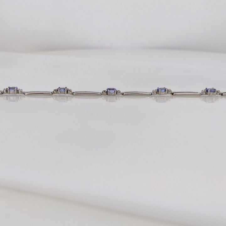 10K WHITE IOLITE OVAL (5) 3X4 WITH (2) MELEE LINK ESTATE BRACELET 3.7 GRAMS
