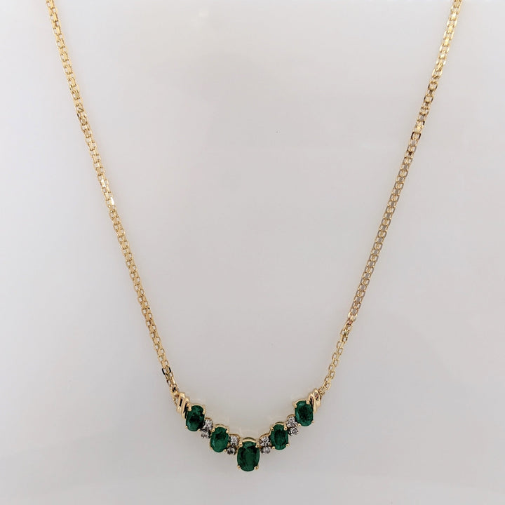 14K EMERALD OVAL 5X7 (1) 4X6 (4) WITH MELEE ESTATE NECKLACE 5.9 GRAMS