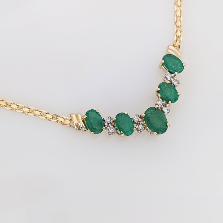 14K EMERALD OVAL 5X7 (1) 4X6 (4) WITH MELEE ESTATE NECKLACE 5.9 GRAMS