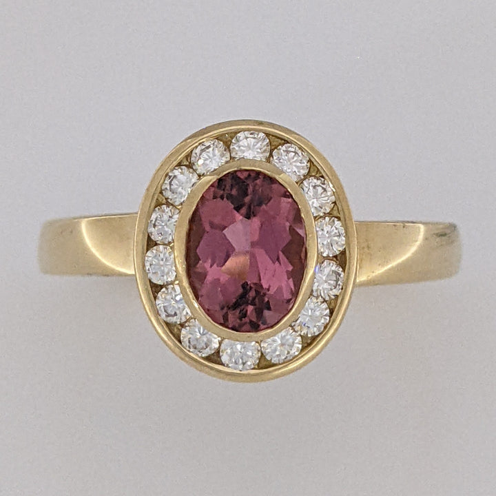 18K PINK TOURMALINE OVAL 5X7 WITH .20 DIAMOND TOTAL WEIGHT (14) ROUND HALO ESTATE RING 5.2 GRAMS