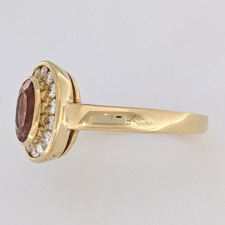18K PINK TOURMALINE OVAL 5X7 WITH .20 DIAMOND TOTAL WEIGHT (14) ROUND HALO ESTATE RING 5.2 GRAMS