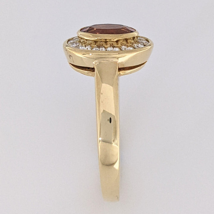 18K PINK TOURMALINE OVAL 5X7 WITH .20 DIAMOND TOTAL WEIGHT (14) ROUND HALO ESTATE RING 5.2 GRAMS