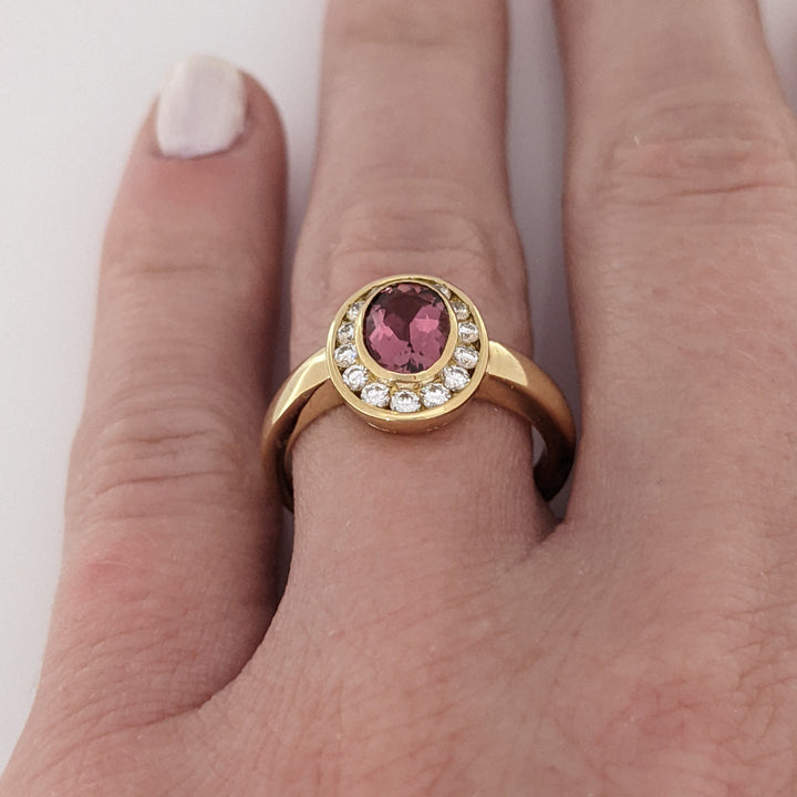 18K PINK TOURMALINE OVAL 5X7 WITH .20 DIAMOND TOTAL WEIGHT (14) ROUND HALO ESTATE RING 5.2 GRAMS