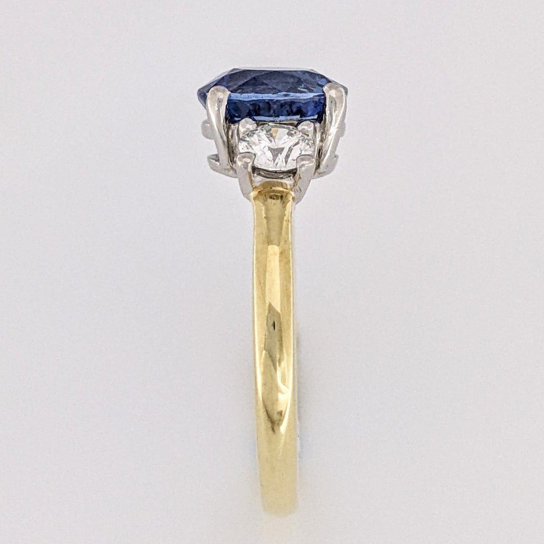 18K/PLATINUM CEYLON SAPPHIRE OVAL 7X8 WITH .45 DIAMOND TOTAL WEIGHT (2) ROUND ESTATE RING 4.3 GRAMS