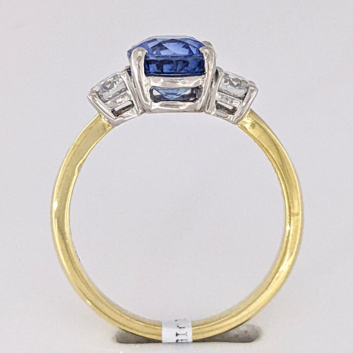 18K/PLATINUM CEYLON SAPPHIRE OVAL 7X8 WITH .45 DIAMOND TOTAL WEIGHT (2) ROUND ESTATE RING 4.3 GRAMS