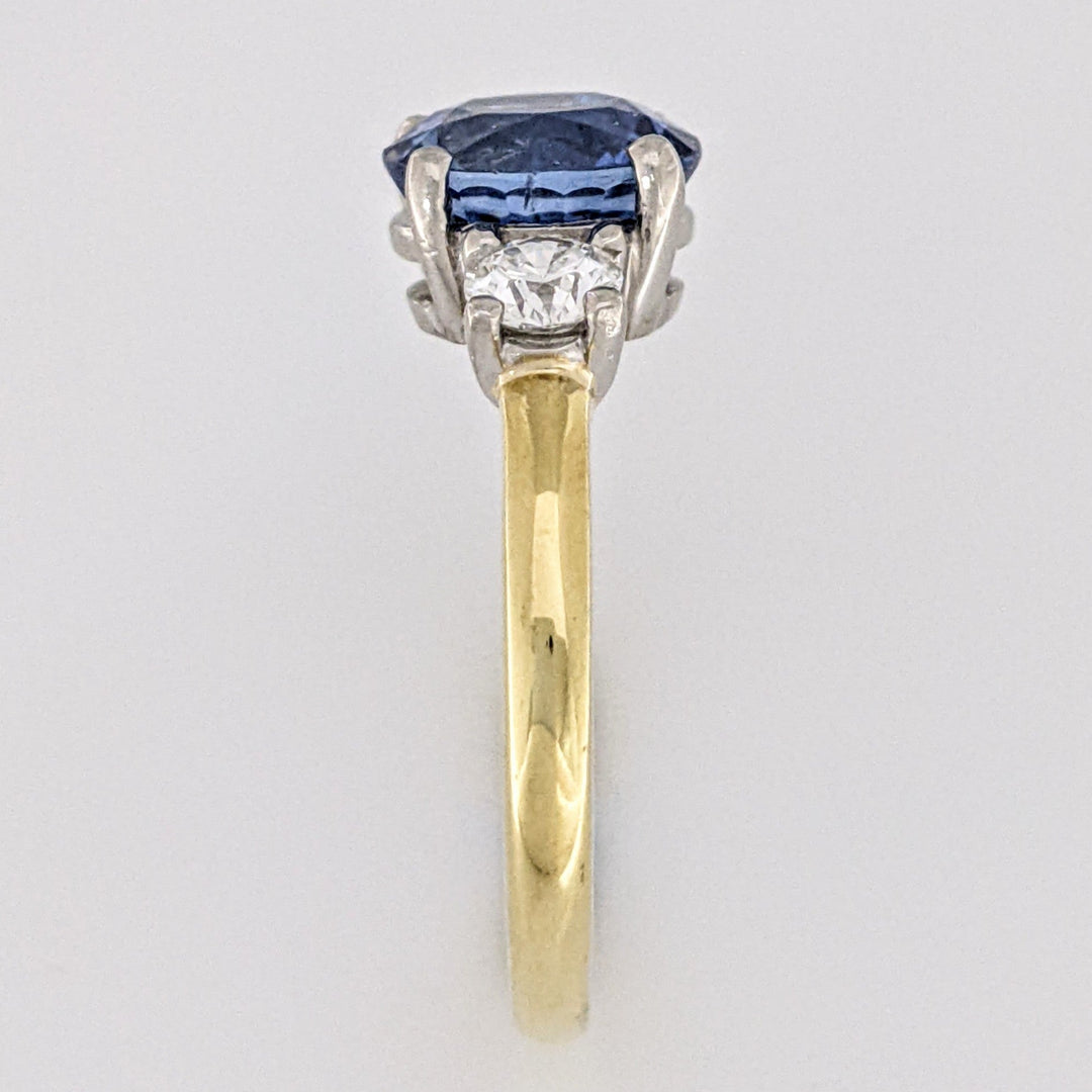 18K/PLATINUM CEYLON SAPPHIRE OVAL 7X8 WITH .45 DIAMOND TOTAL WEIGHT (2) ROUND ESTATE RING 4.3 GRAMS