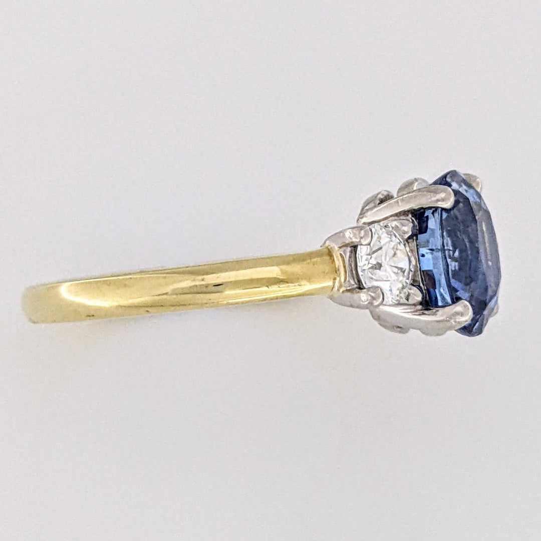 18K/PLATINUM CEYLON SAPPHIRE OVAL 7X8 WITH .45 DIAMOND TOTAL WEIGHT (2) ROUND ESTATE RING 4.3 GRAMS