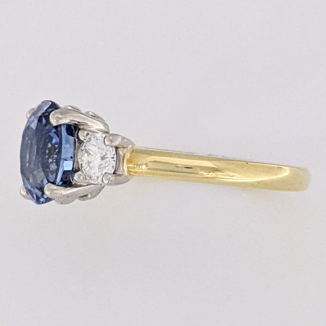 18K/PLATINUM CEYLON SAPPHIRE OVAL 7X8 WITH .45 DIAMOND TOTAL WEIGHT (2) ROUND ESTATE RING 4.3 GRAMS