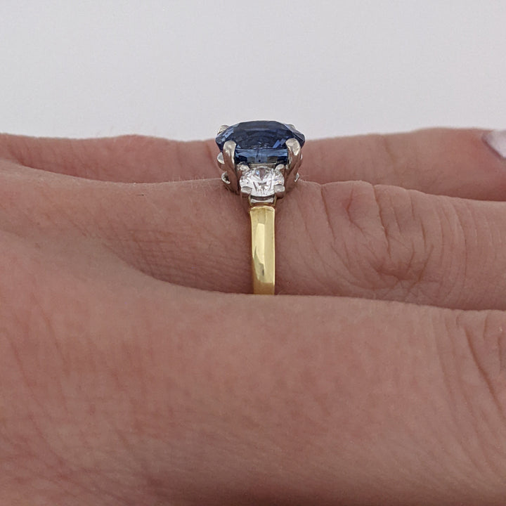 18K/PLATINUM CEYLON SAPPHIRE OVAL 7X8 WITH .45 DIAMOND TOTAL WEIGHT (2) ROUND ESTATE RING 4.3 GRAMS